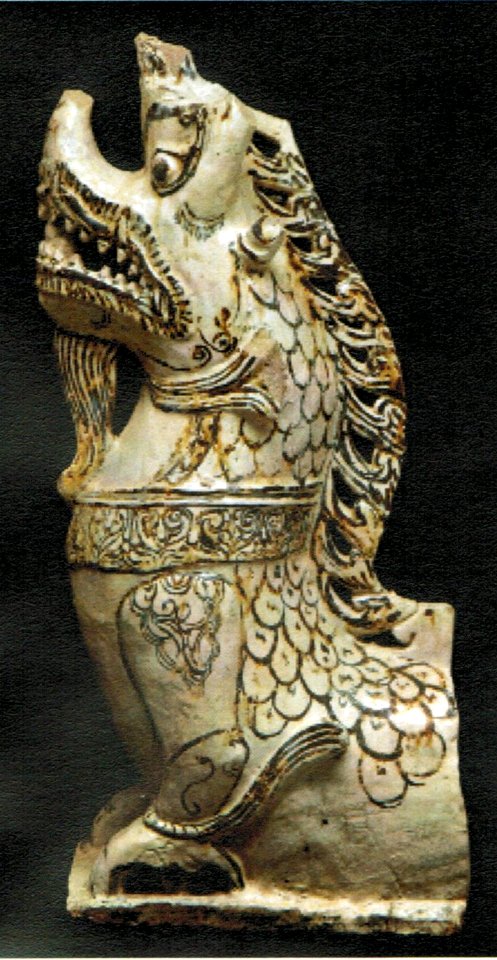 Thai Naga finial, Sukhothai kingdom, 14th century, stoneware with underglaze iron decoration photo