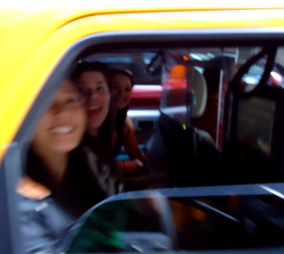 Three women in a taxi in Manhattan who said hello