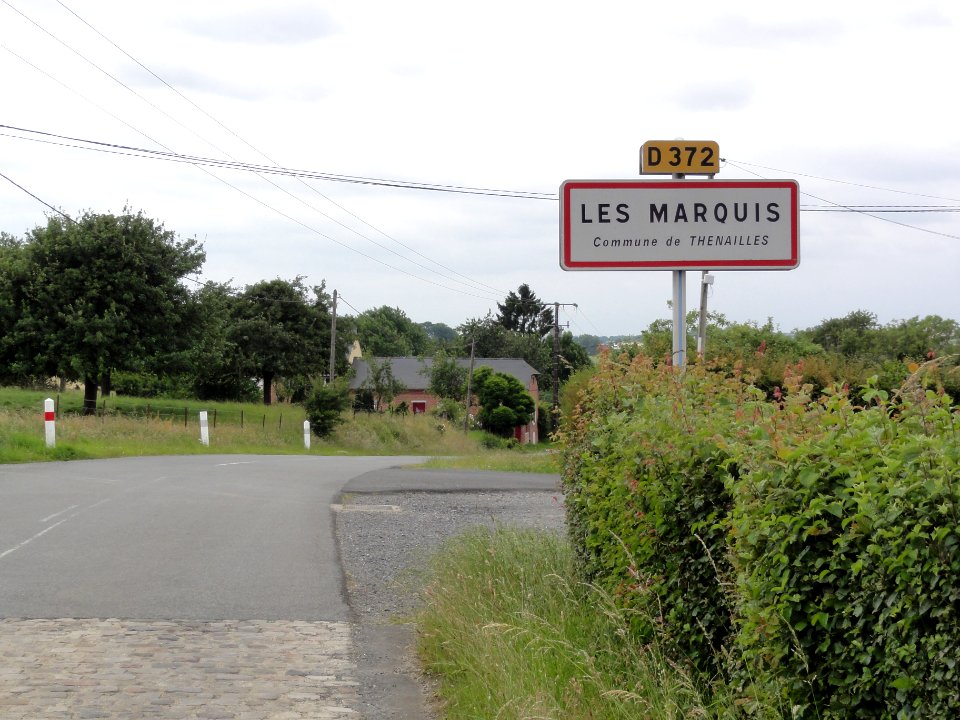 Thenailles (Aisne) city limit sign les Marquis