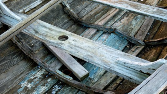 Thwarts in old wooden sailing skiff photo