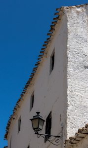 Tiles and white wall, Alhama de Granada, Andalusia, Spain photo