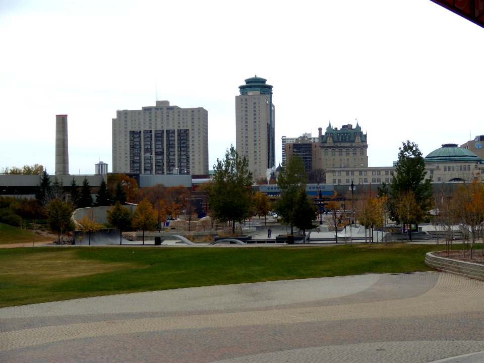 The Plaza Skatepark at the Forks, Winnipeg, with downtown buildings visible in background 02