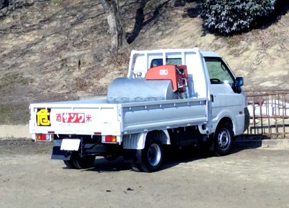 The rearview of 4th generation Mazda Bongo truck as delivery truck of liquor seller
