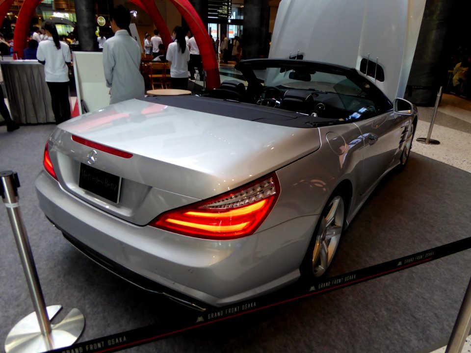 The rearview of Mercedes-Benz SL550 (R231) with her roof open