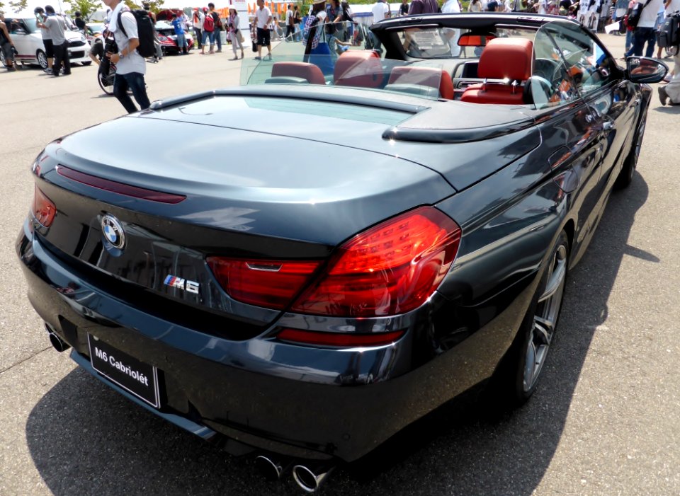The rearview of BMW M6 Cabriolet (F12) with its roof open