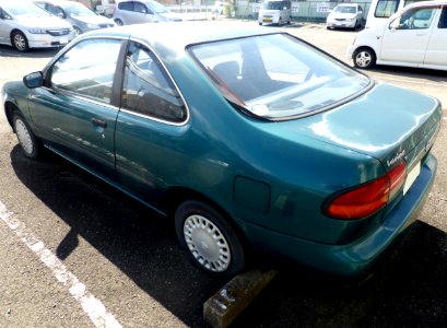 The rearview of Nissan Lucino Coupé (B14),whose tire is punctured