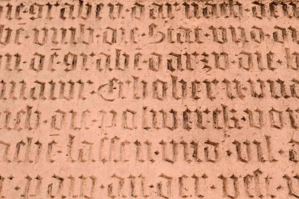 Old german scripture engraving stone