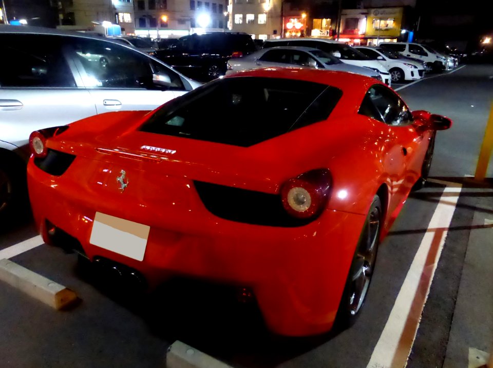 The rearview of Ferrari 458 Italia at night