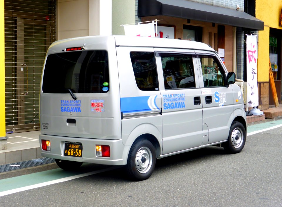 The rearview of Nissan NV100 CLIPPER (DR64V) as delivery van of Sagawa Express