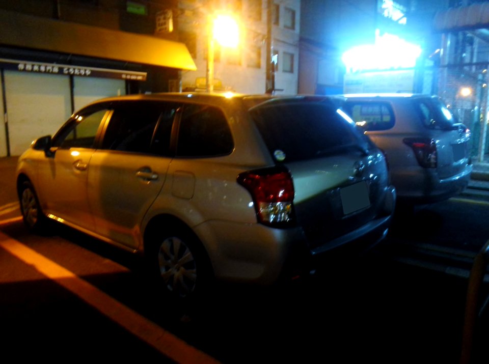 The rearview of Toyota COROLLA FIELDER (E140&E160) at night
