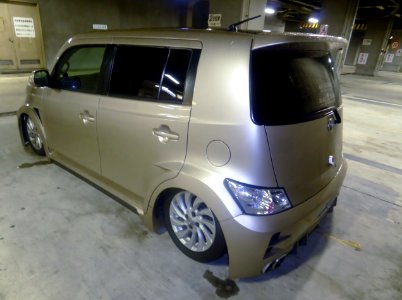 The rearview of Toyota bB (QNC20) with body lowered