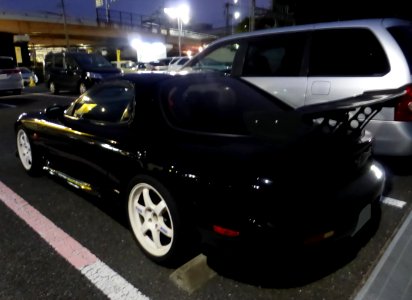 The rearview of tuned εfini RX-7 (FD3S) at night