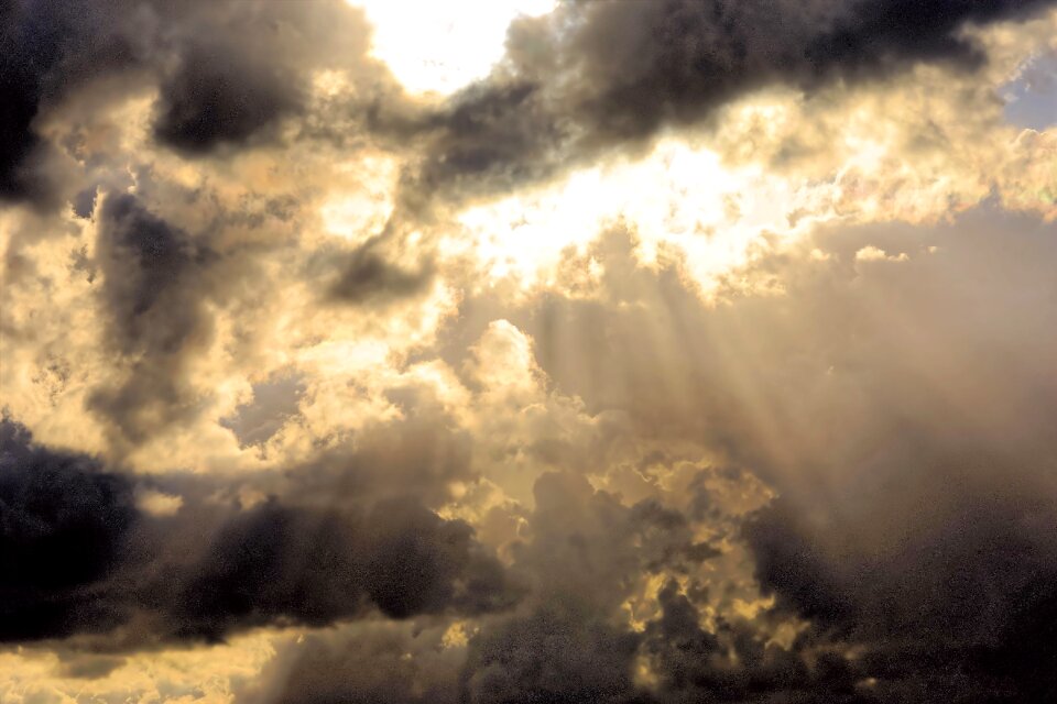 Covered sky clouds form spotlight