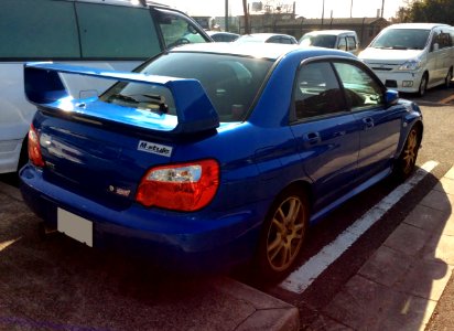 The rearview of blue Subaru IMPREZA WRX STi (GDB)