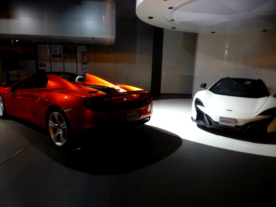 The rearview of McLaren MP4-12C SPIDER & the frontview of McLaren 650S SPIDER