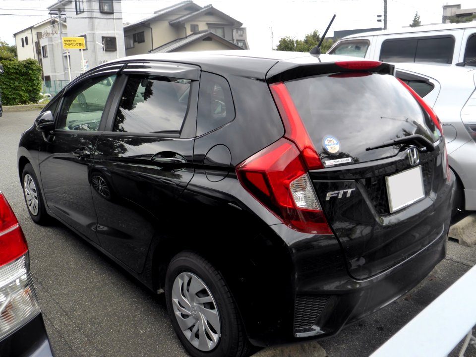 The rearview of Honda FIT 13G (GK3)