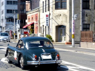 The rearview of Jaguar XK150 Fixed Head Coupe