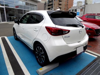 The rearview of Mazda DEMIO XD Touring (DJ) with MAZDASPEED parts