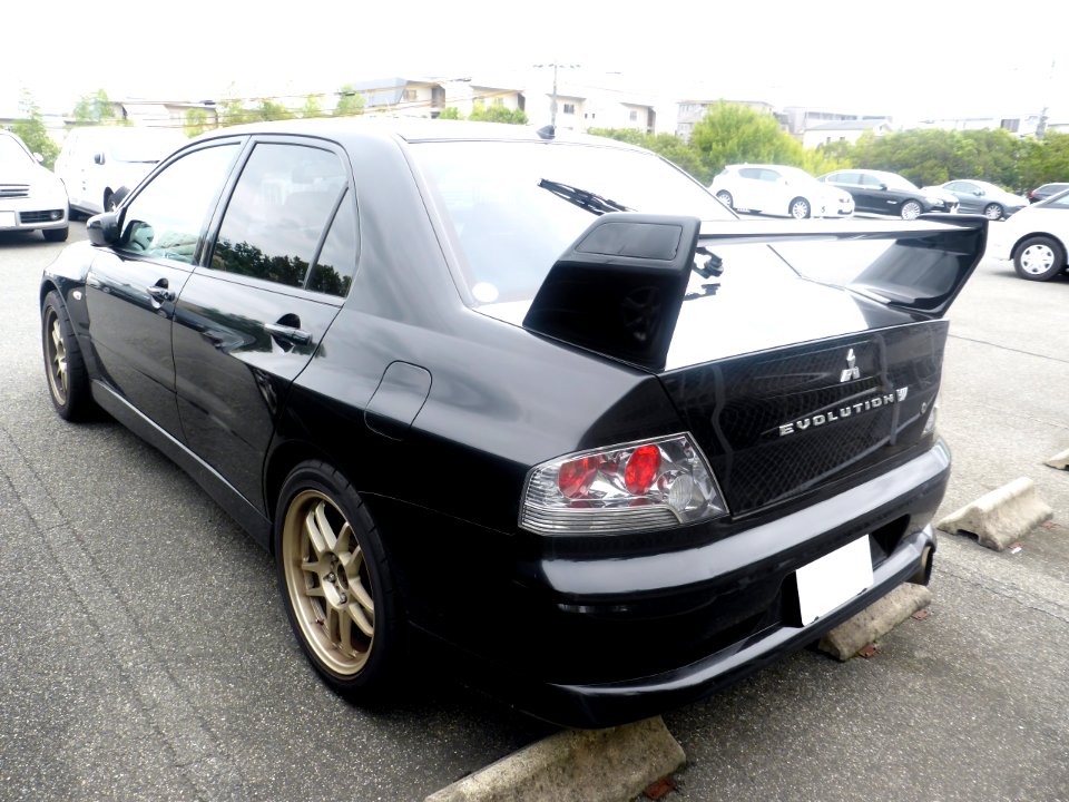 The rearview of tuned Mitsubishi LANCER EVOLUTION VII GT-A