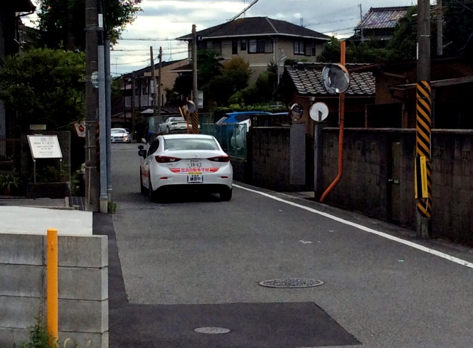 The rearview of Mazda AXELA (BM) as an instruction car of NARA AUTO SCHOOL