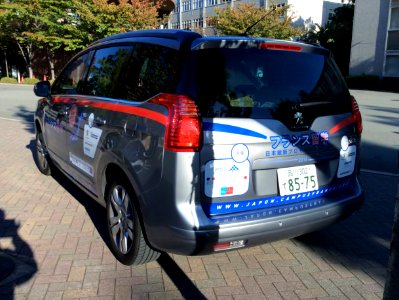 The rearview of Peugeot 5008 as a promotion car for studying in France