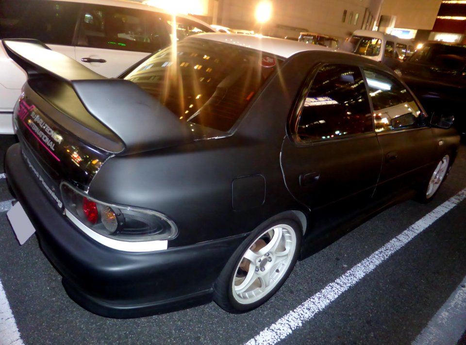 Tuned Subaru Impreza WRX STi (GC8) at night rear