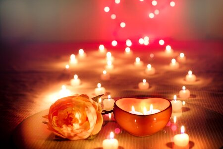 Lit candles glow romance photo