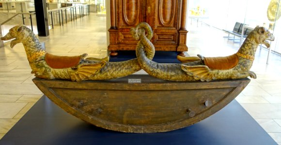 Two-seated seesaw (teeter-totter) with carved dolphins, Northern Italy or Germany, mid 1700s, wood, textiles, iron - Germanisches Nationalmuseum - Nuremberg, Germany - DSC02514