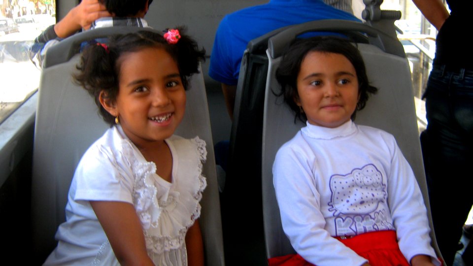 Two happy girl sited on chair - Nishapur 1