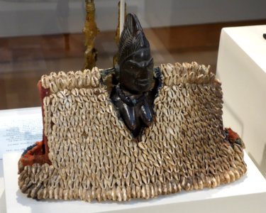 Twin Memorial Figure (ere Ibeji) with Cowrie Garment (ewu ileke), Nigeria, Yoruba people, 20th century, wood, glass beads, cowrie shells, plant fiber, leather - Chazen Museum of Art - DSC01821