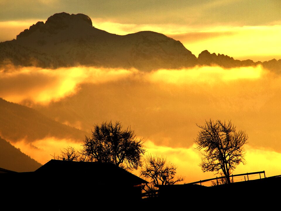Mountains sun evening mist