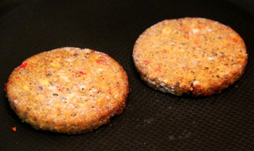 Two Dr Praeger's burgers cooking, Feb 2019