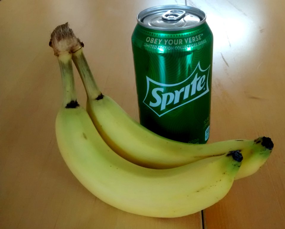 Two bananas and a can of Sprite