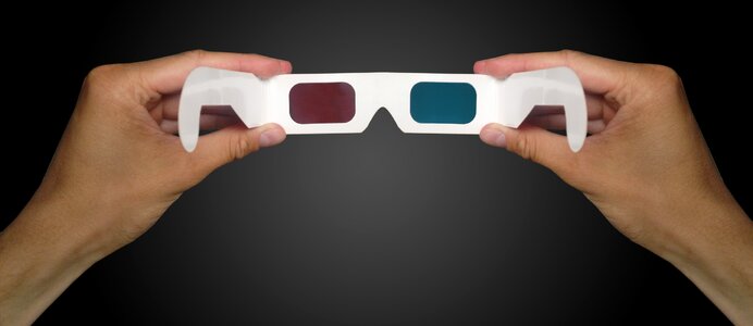 Glasses in hand colorful glasses 3d
