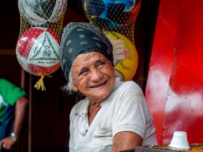 Old woman selling photo