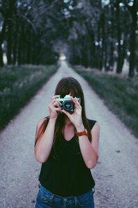 Person photographer road