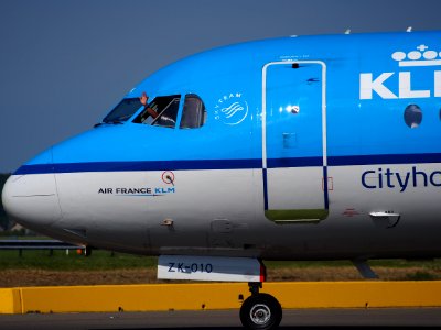PH-KZK KLM Fokker 70 taxiing at Schiphol (AMS - EHAM), The Netherlands, 18may2014, pic-2 photo