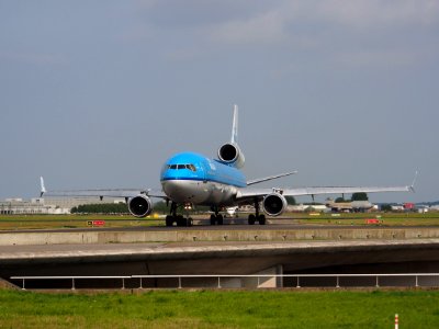 PH-KCE KLM Royal Dutch Airlines KLM, McDonnell Douglas MD11 cn 48559, taxiing 14july2013 pic1 photo