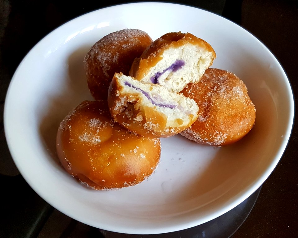 Philippine buñuelo (bunwelo) doughnuts with ube filling