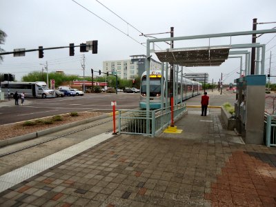 Phoenix Valley Metro light rail train approaching station photo