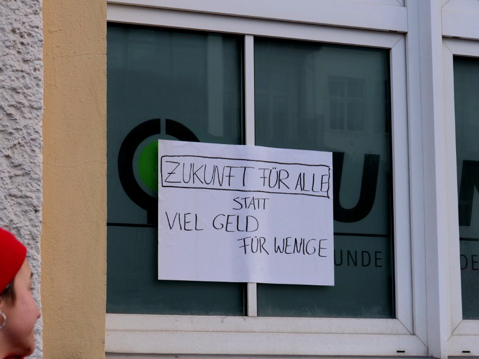 Protest action with the paris agreement at the BUND office Berlin 10