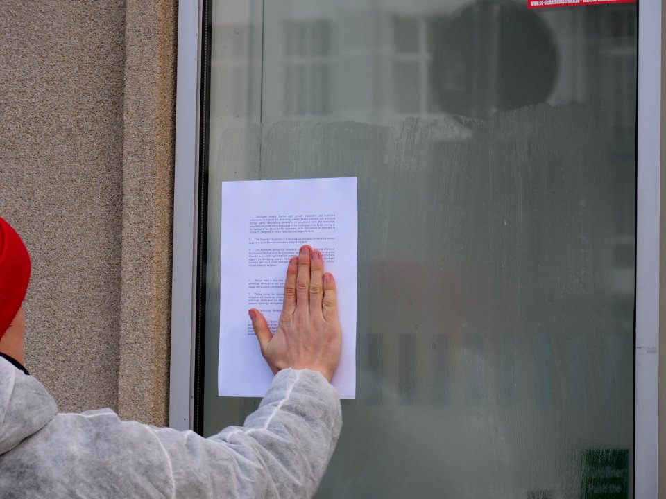 Protest action with the paris agreement at the BUND office Berlin 07