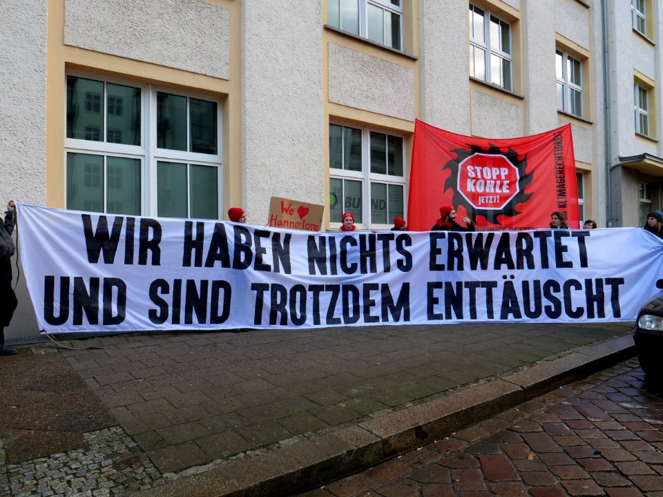 Protest action with the paris agreement at the BUND office Berlin 09