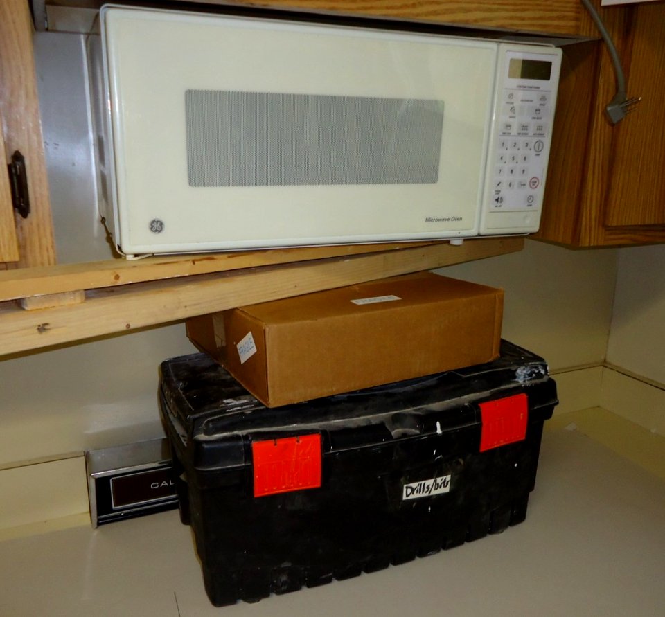 Project to move cabinet and microwave 4 inches higher