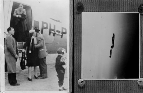 Prinses Juliana stapt uit een vliegtuig en wordt omhelst door prins Bernhard in , Bestanddeelnr 8782