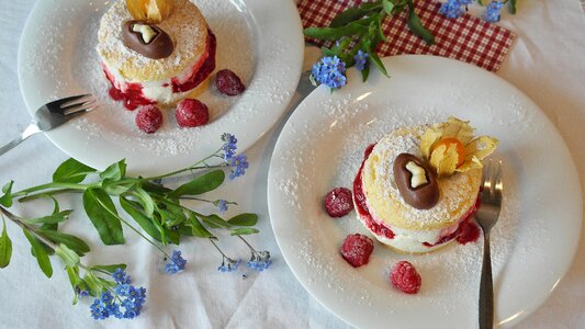 Raspberries dessert cream photo