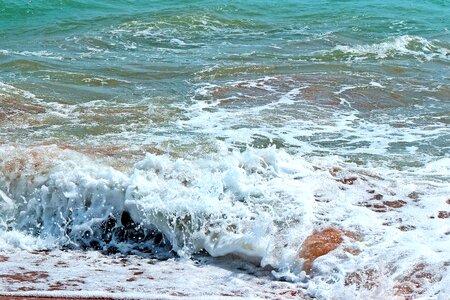 Waves sandy beach water