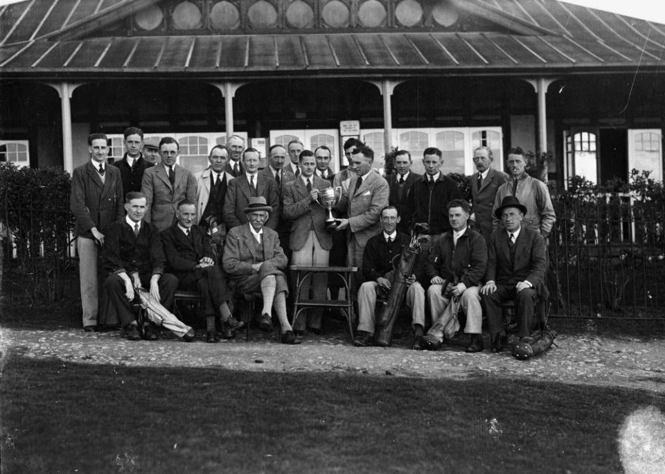 Presentation to a male golfer outside Llandrindod Wells Golf Club pavilion (1294571)
