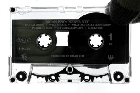 Prerecorded cassette (Brian Eno - Nerve Net) with separate tape guide insert 04