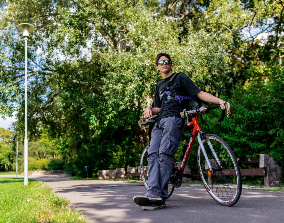 Sunglasses man bike photo